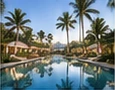 Palm-lined resort swimming pool