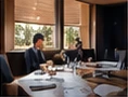 Business partners meeting around a table